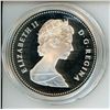 Image 2 : 1983 World University Games Proof Silver Dollar. Housed in its original hard plastic holder.