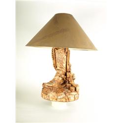 Matching pair of cowboy boot with gun and