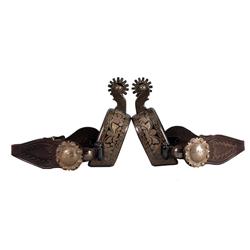 Floral etched E. Garcia spurs