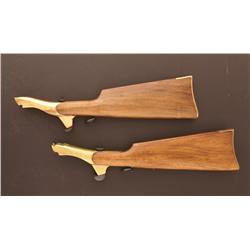 Two Reproduction Colt pistol stocks