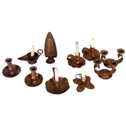 Collection of 10 copper candlesticks