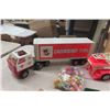 Image 2 : Assortment of Toys ; Canadian Tire Semi, Plastic Fire Ladder Truck, 2 Bags of Plastic Toys, Several 