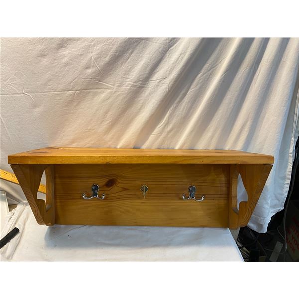 Wall shed with hooks