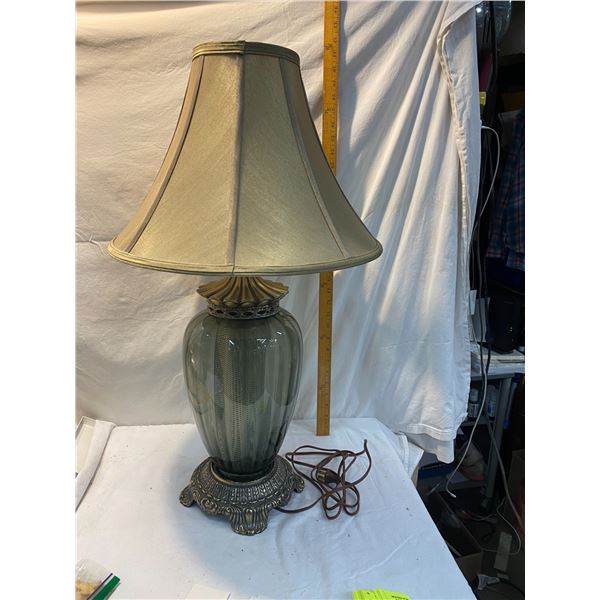 Vintage lamp base lights up beautifully