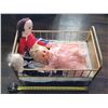 Image 1 : VINTAGE METAL TOY DOLL CRIB WITH 3 DOLLS