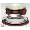 Image 1 : STACK OF SIX 12" X 8" STEEL DISHES W/ WOOD TRIVETS