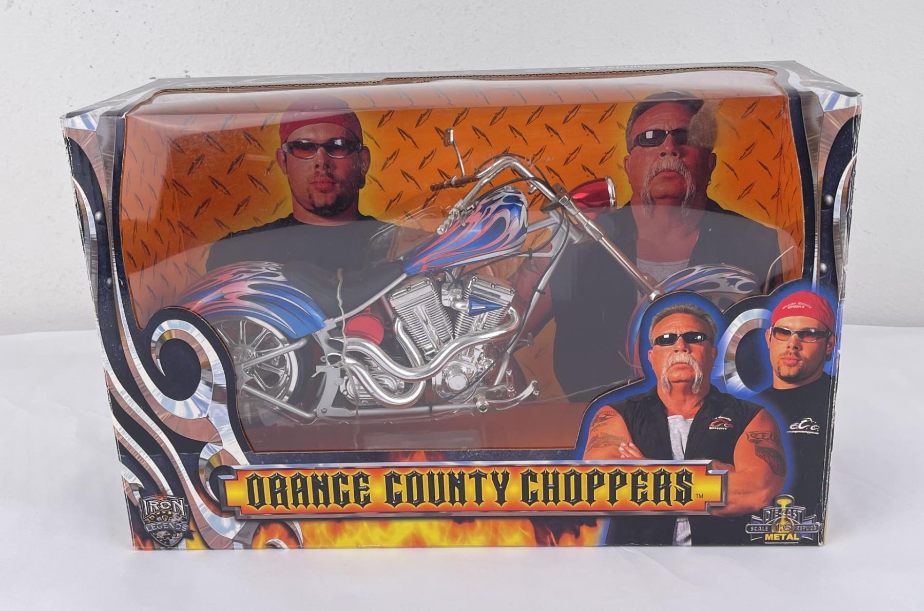 A die-cast Orange County Choppers motorcycle, a miniature tribute to the brand's iconic designs.