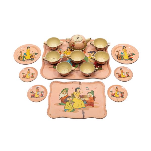 A 16- Piece Snow White Tin Tea Set.