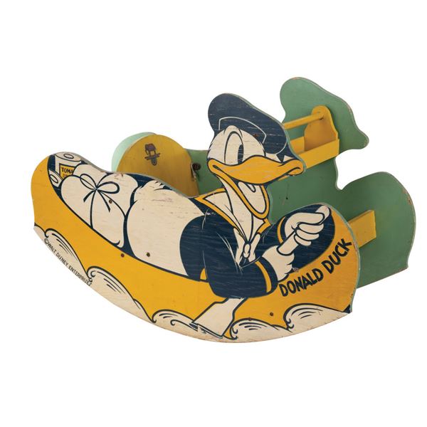 A Donald Duck Canoe Rocking Toy.