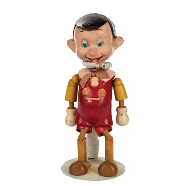 A Pinocchio 11" Wood Jointed Doll by Ideal.
