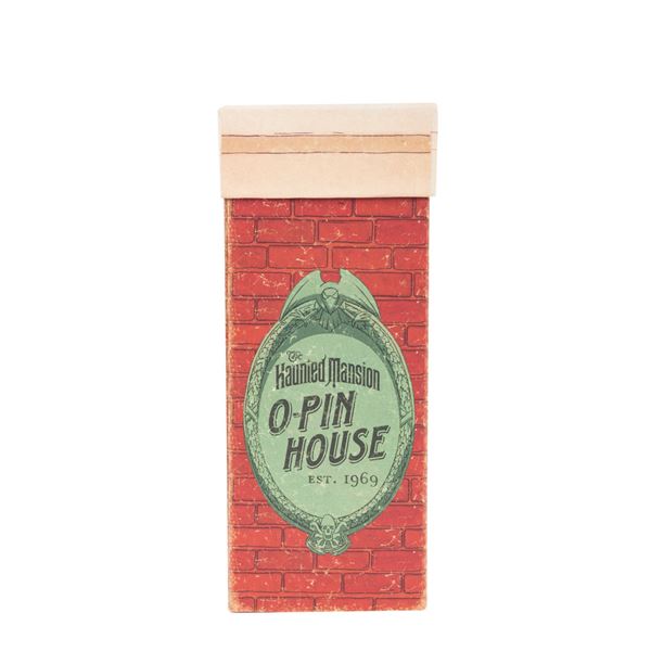 An O-Pin House Raven Pin Set.