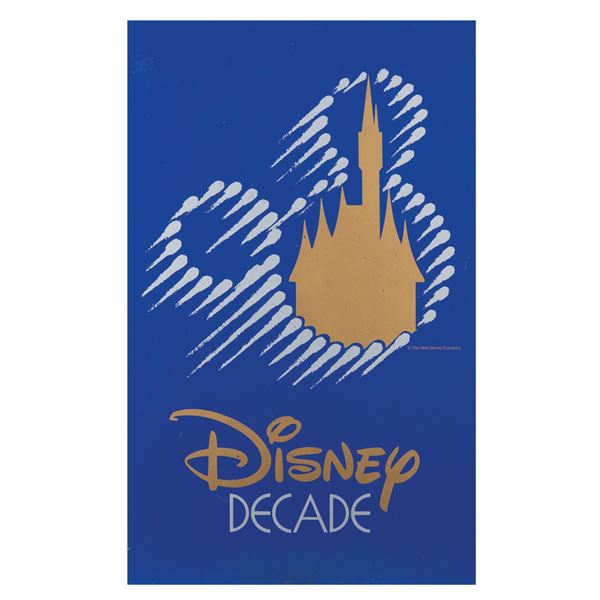 A "Disney Decade" Acrylic Sign.