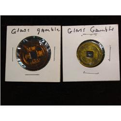 1907. (2) Glass Casino Tokens, Chinese Cash Coins.