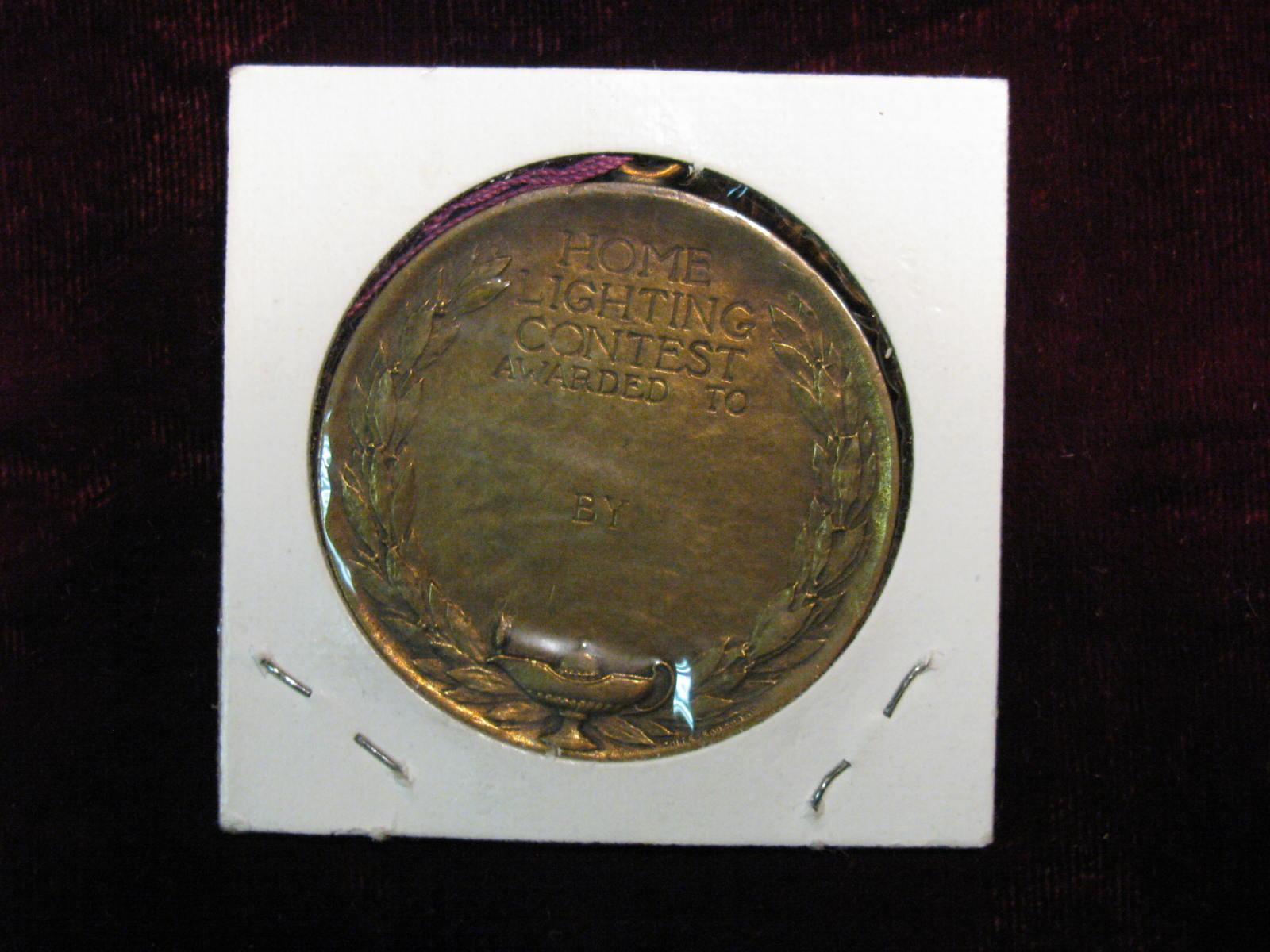 3083. Thomas Edison Award Bronze Medal.