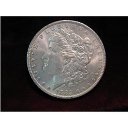 3500. 1885O Morgan Dollar. AU.