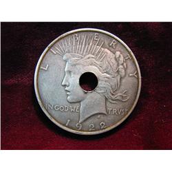 3544. 1922P Peace Dollar. VF with Hole in the Head.