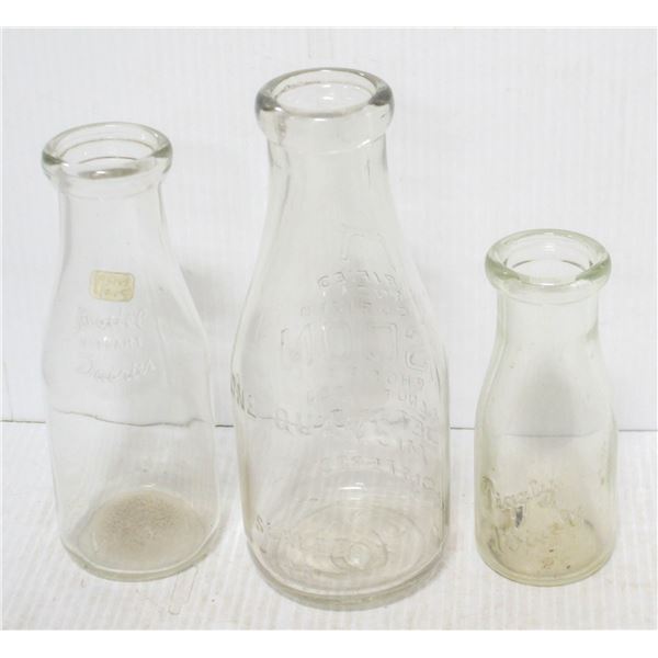 LOT OF ANTIQUE EMBOSSED MILK BOTTLES