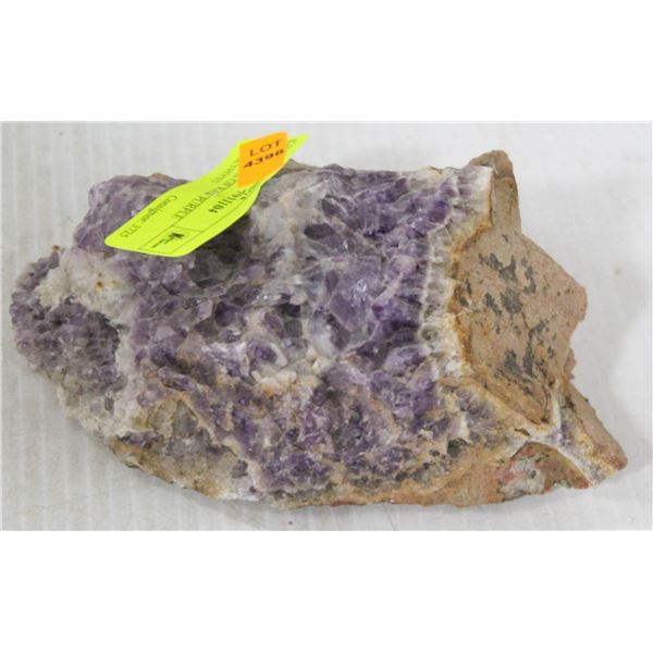 SECTION OF RAW PURPLE AMETHYST