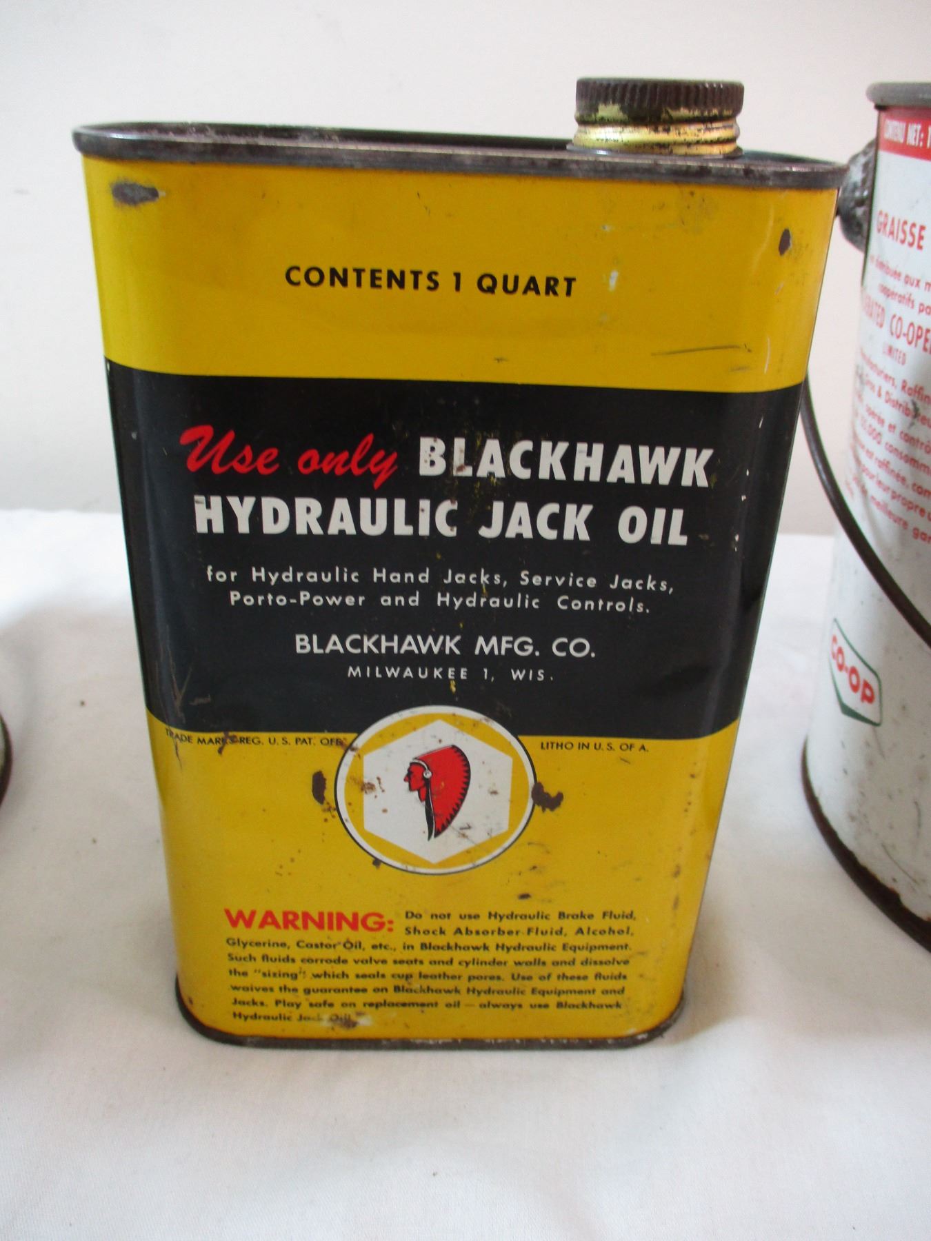 BlackHawk hydraulic jack oil (with contents) + Pioneer Antifreeze tin