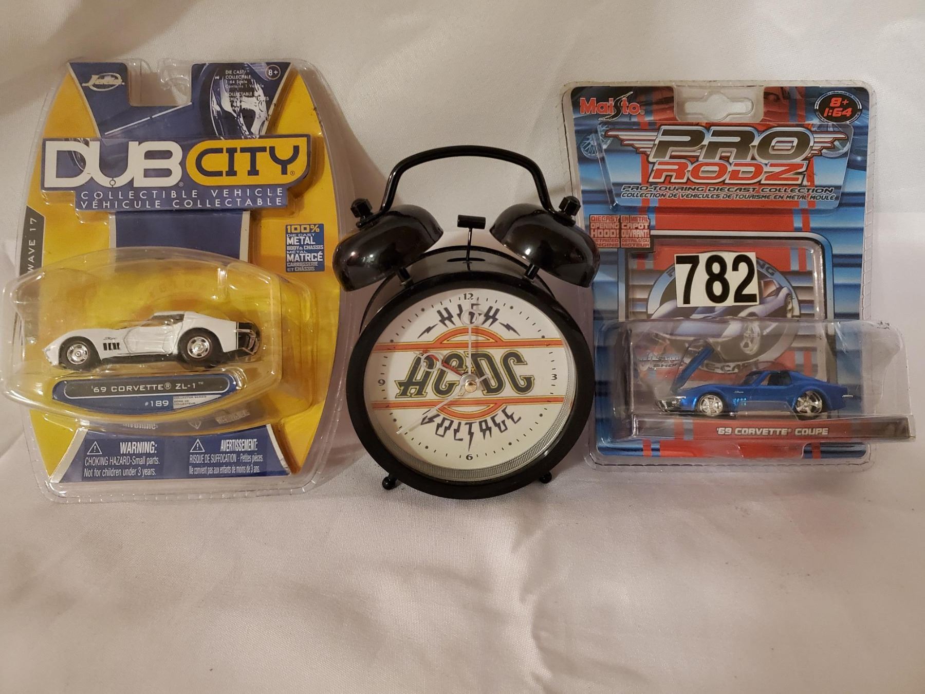 2 Corvette collector cars & AC/DC alarm clock