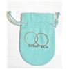 Image 1 : 10 KARAT STAMPED GOLD HOOPS IN TIFFANY'S POUCH