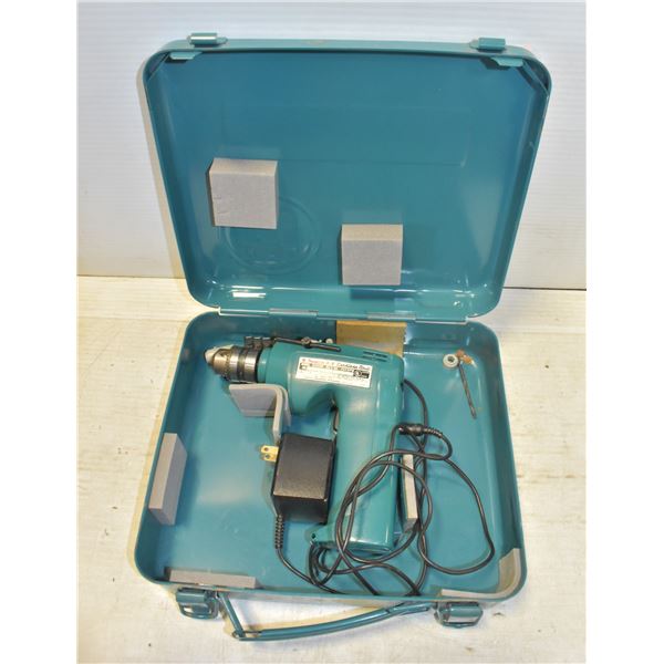 MAKITA DRILL IN METAL CASE