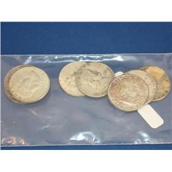 Lot of 8 Franklin Half Dollars