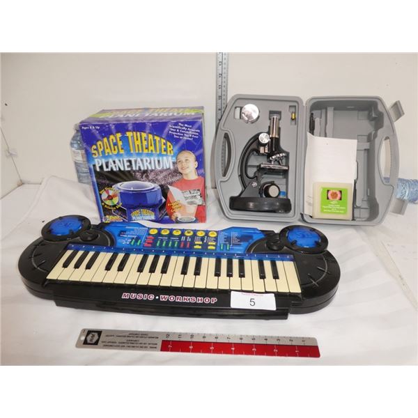 toy keyboard, planetarium, microscope