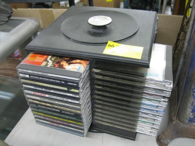 COMPACT DISC HOLDER W/CDs
