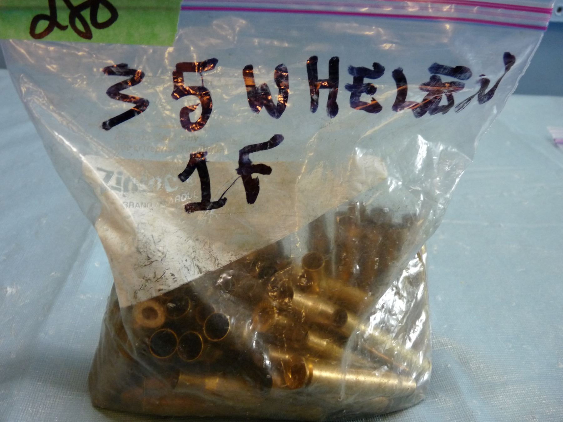 Bag of brass marked 35 Whelen brass approximately one pound