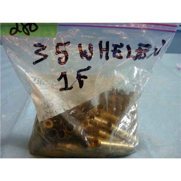 Bag of brass marked 35 Whelen brass approximately one pound