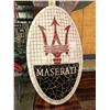 Image 1 : Maserati porcelain Decorative wall hanging (Approximately 28in x 16 1/2in)