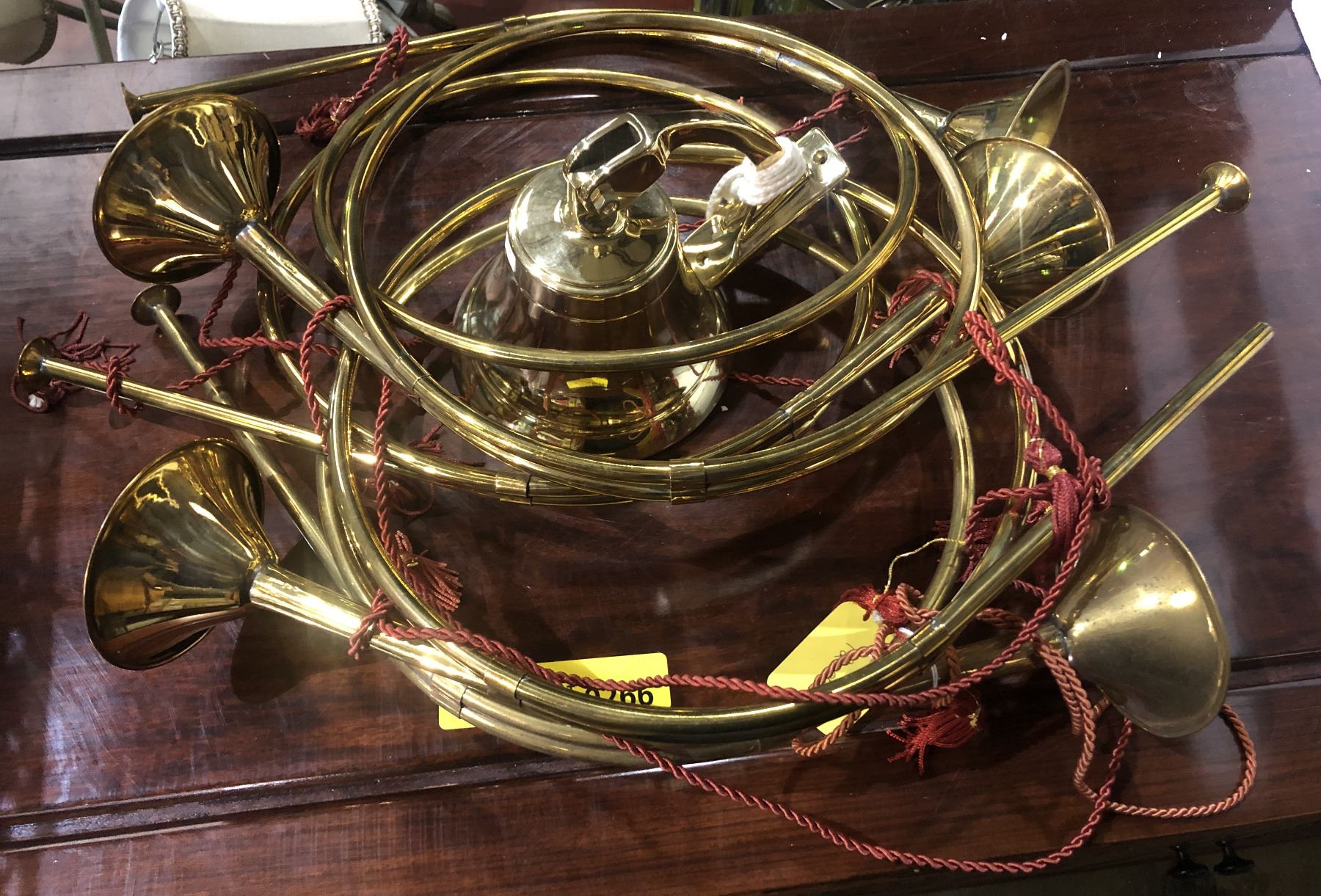 Group of prop instruments & vintage reproduction brass bell