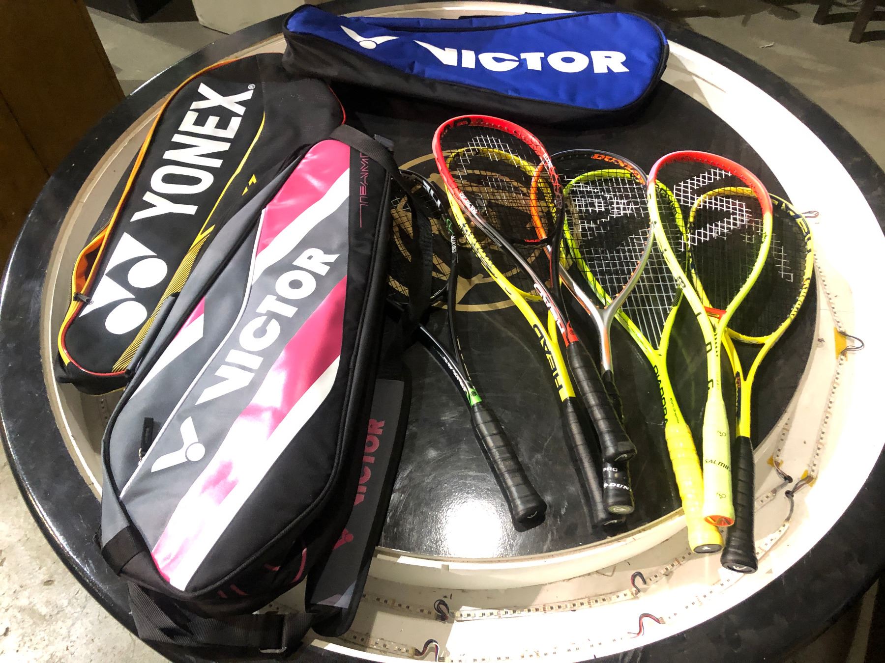 Assorted Rackets Large group of assorted squash rackets w/ 3 carrying bags