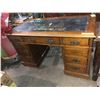 Image 1 : Late 1800s 9 drawer leather top center rolling wooden desk (approx. 4ft wide x 2ft depth x 29in heig