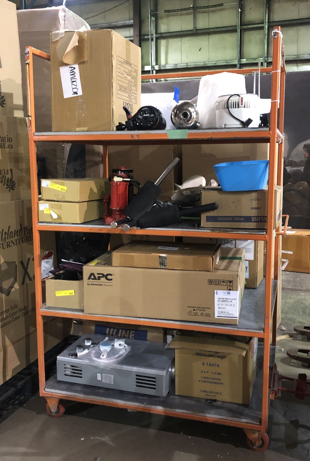 4 tier industrial rolling shelving rack w/ contents (rack approx. 50in ...