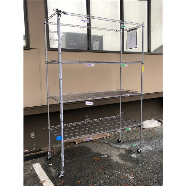 Four tier industrial rolling shelving rack (approx. 7 1/2ft tall x 59in wide x 23 1/2in depth)