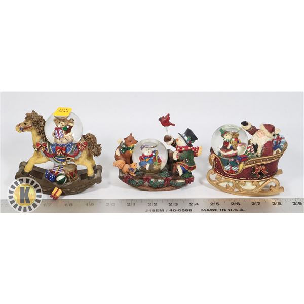 BUNDLE OF THREE CHRISTMAS THEME ROCKING SNOW GLOBE