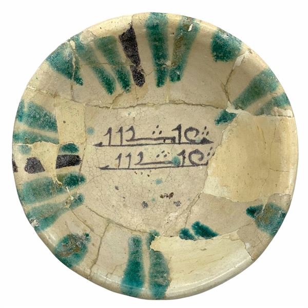 AN ABBASID CALLIGRAPHIC POTTERY BOWL MESOPOTAMIA 9TH CENTURY