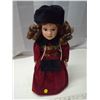 Image 1 : Porcelin Doll brown hair red dress black hat