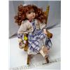 Image 1 : Porcelin Doll in rocking chair