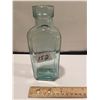 Image 1 : 7" Turning Blue Bottle