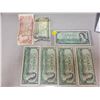 Image 1 : Lot of 7 older Canadian bills - Five 1954 $1.00 (one appears to be uncirculated), 1973 $1.00, 1974 $