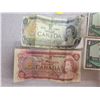 Image 3 : Lot of 7 older Canadian bills - Five 1954 $1.00 (one appears to be uncirculated), 1973 $1.00, 1974 $