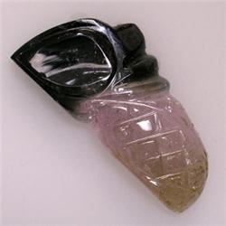 10.66 CTS CARVED TOURMALINE 24x12 MM