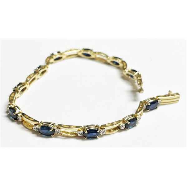 14K Gold Bracelet With Dark Blue Stones 9.9 Grams