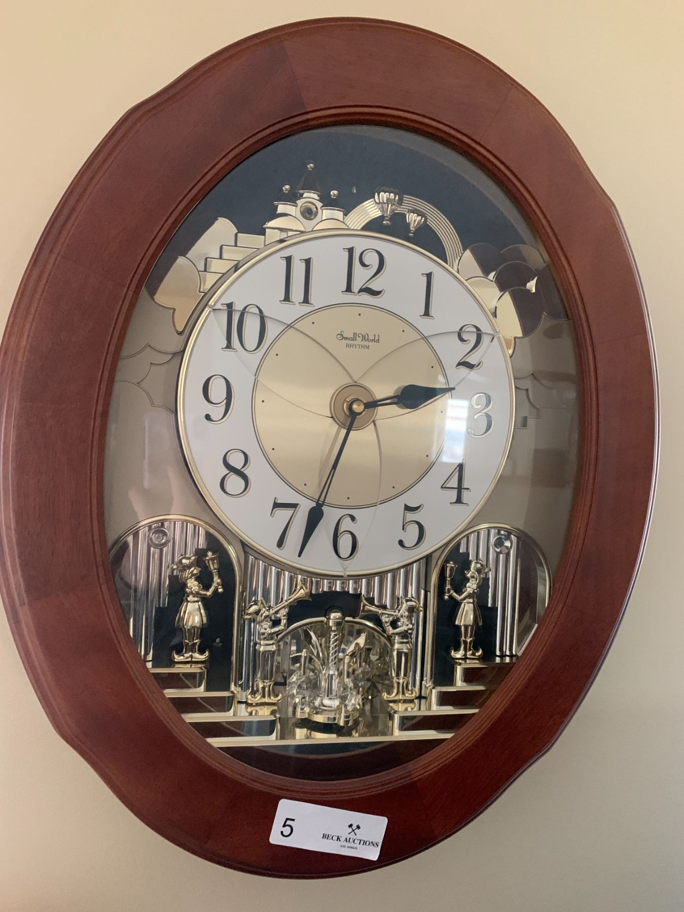 Small World Rhythm Wall Clock w/ Metallic and Crystal Accents Beck Auctions Inc.