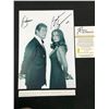 Image 1 : ROGER MOORE AND BARBARA BACH SIGNED JAMES BOND 8 X 10 (RA COA)