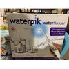 Image 1 : Waterpik ultra Water Flosser w/ tip storage case and premium travel case