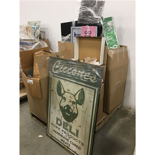 PALLET LOT OF ASSORTED FILM INDUSTRY PROP ADVERTISING SIGNAGE & GRAPHIC ART